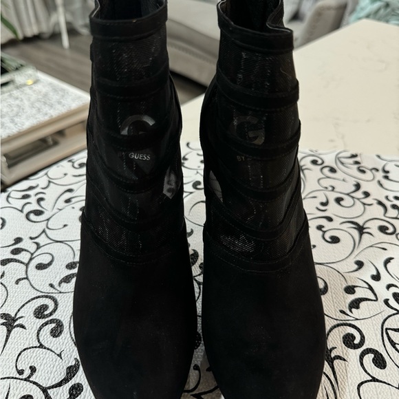 Black high heels ankle boots by Guess. Suede & Sheer fabric detailing. - Picture 1 of 8